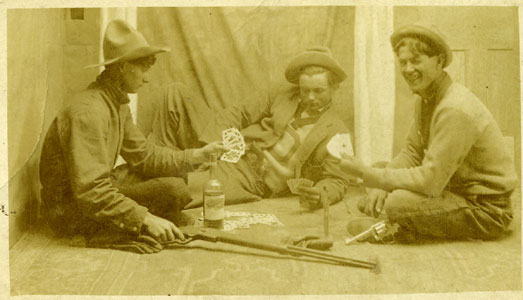 Photo of Owen and two friends playing poker